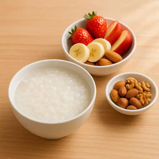 A bowl of rice porridge with fresh fruit, representing healthy eating.